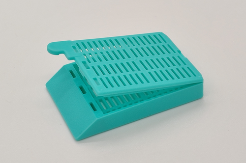 plastic biopsy tissue cassettes with attached lid and 35 angled face aqua 